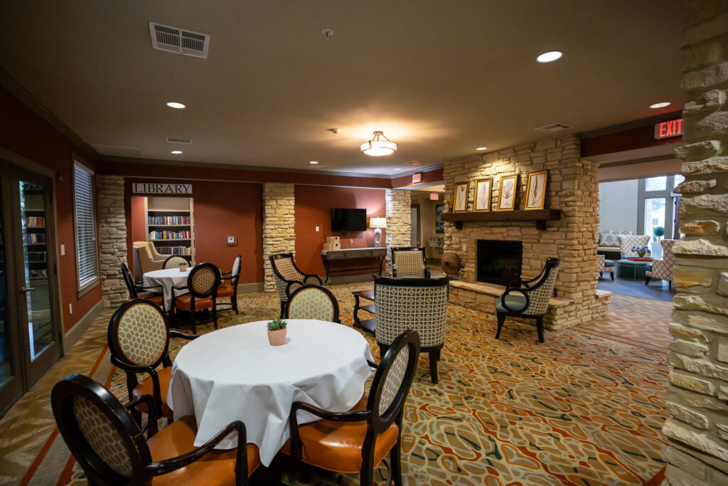 Cozy Dining Room with Fireplace for Senior Assisted Living San Antonio