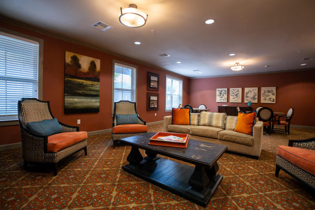 Warm Living Room with Orange Accents at Assisted Living San Antonio TX