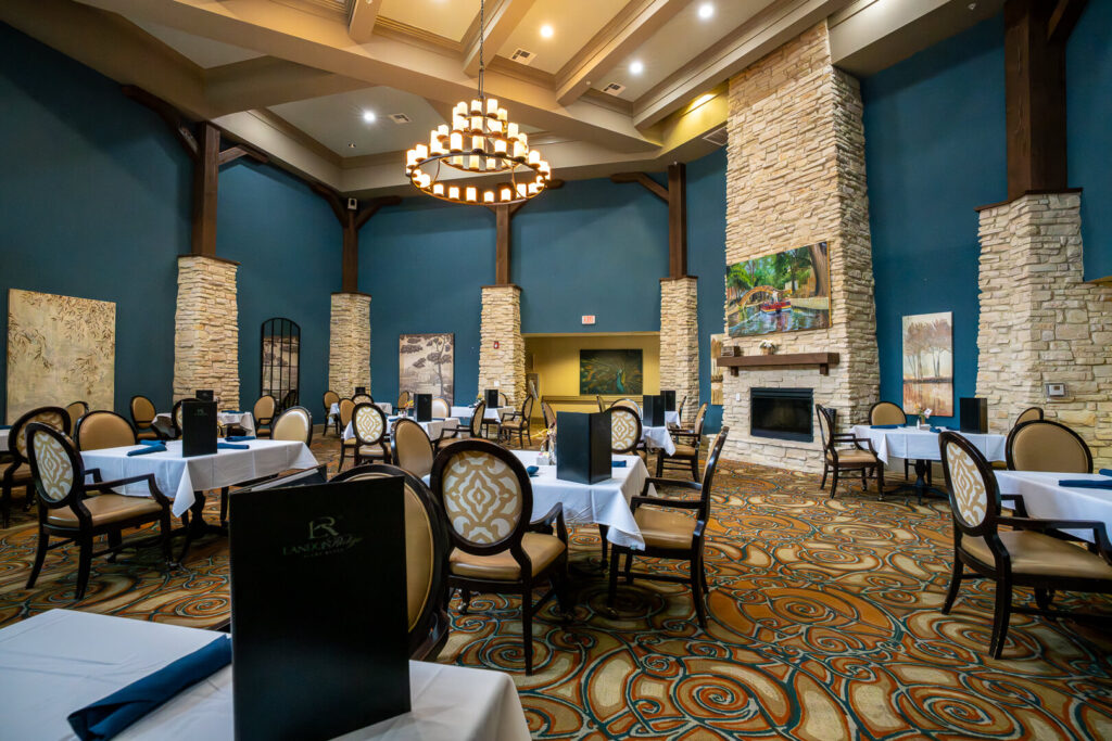 Grand Dining Hall with Stone Fireplace for Assisted Living with Memory Care