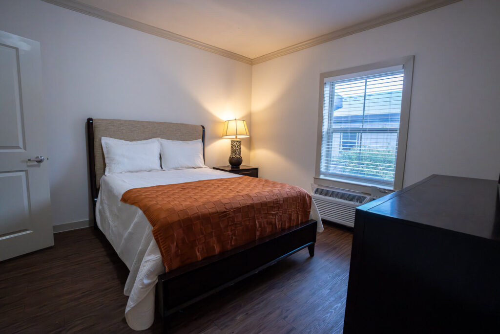 Private Bedroom with Queen Bed for Assisted Living with Memory Care